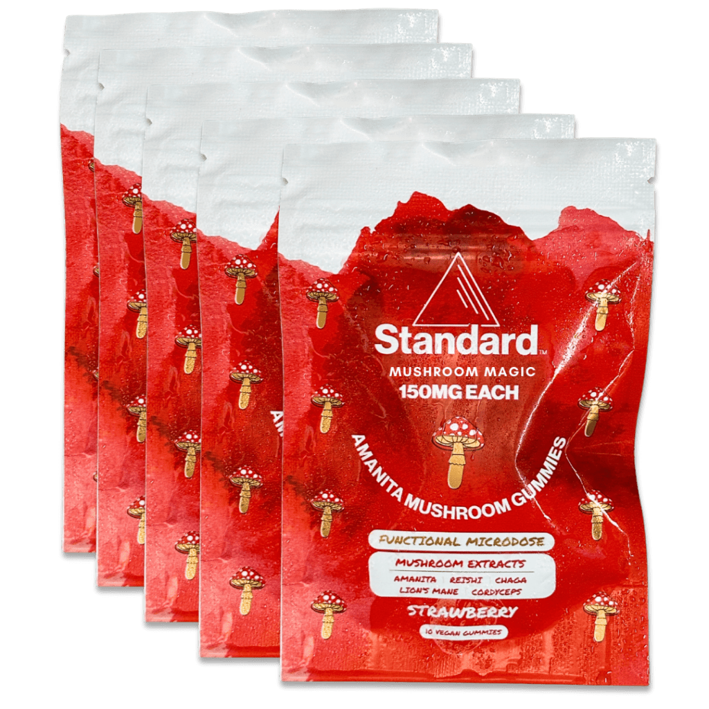 Five packets of Standard Mushroom Magic gummies, featuring colorful mushroom graphics, labeled with "Strawberry" and "150mg each."